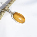 Pendentif "Confiance" en Oeil de Tigre Ref : Odt6